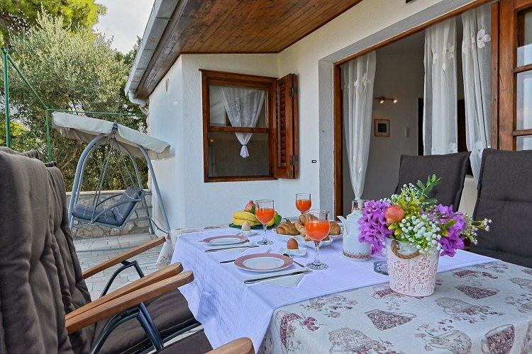 Two bedroom house with terrace and sea view Postira, Brač (K-6052)